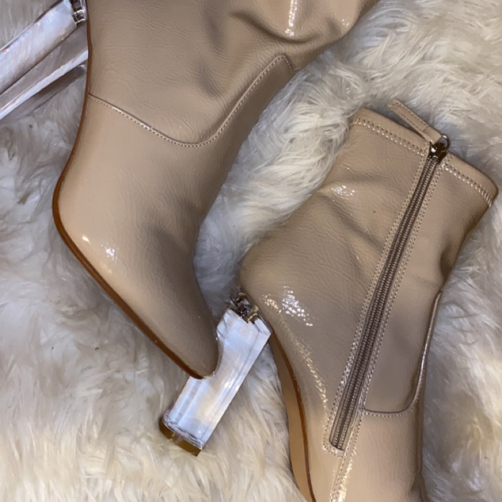 Booties with clear heel.